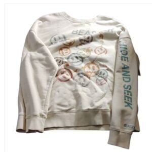 Beaster cream faded smiley faces